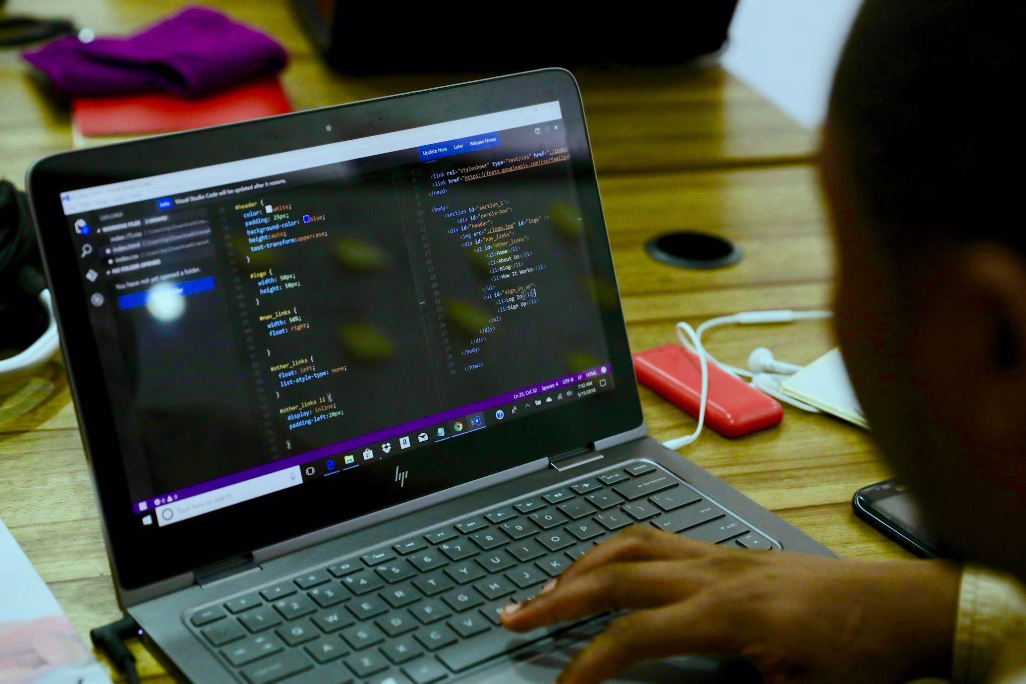 A workspace setup with a computer and coding environment